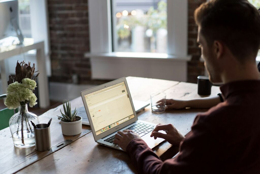 Working at a desk on a laptop